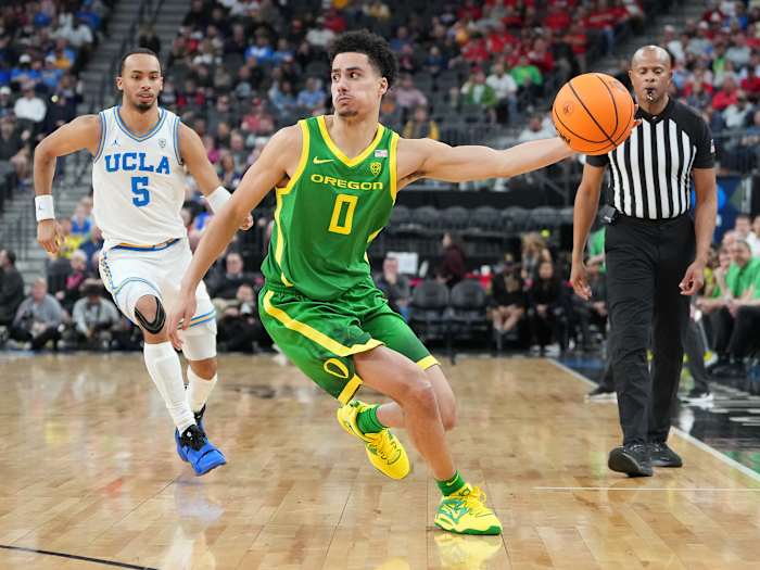Oregon Ducks guard Will Richardson grabs the basketball.